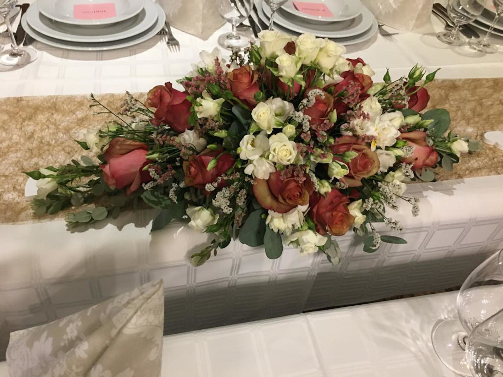 Tischgesteck von Blumen Wurm